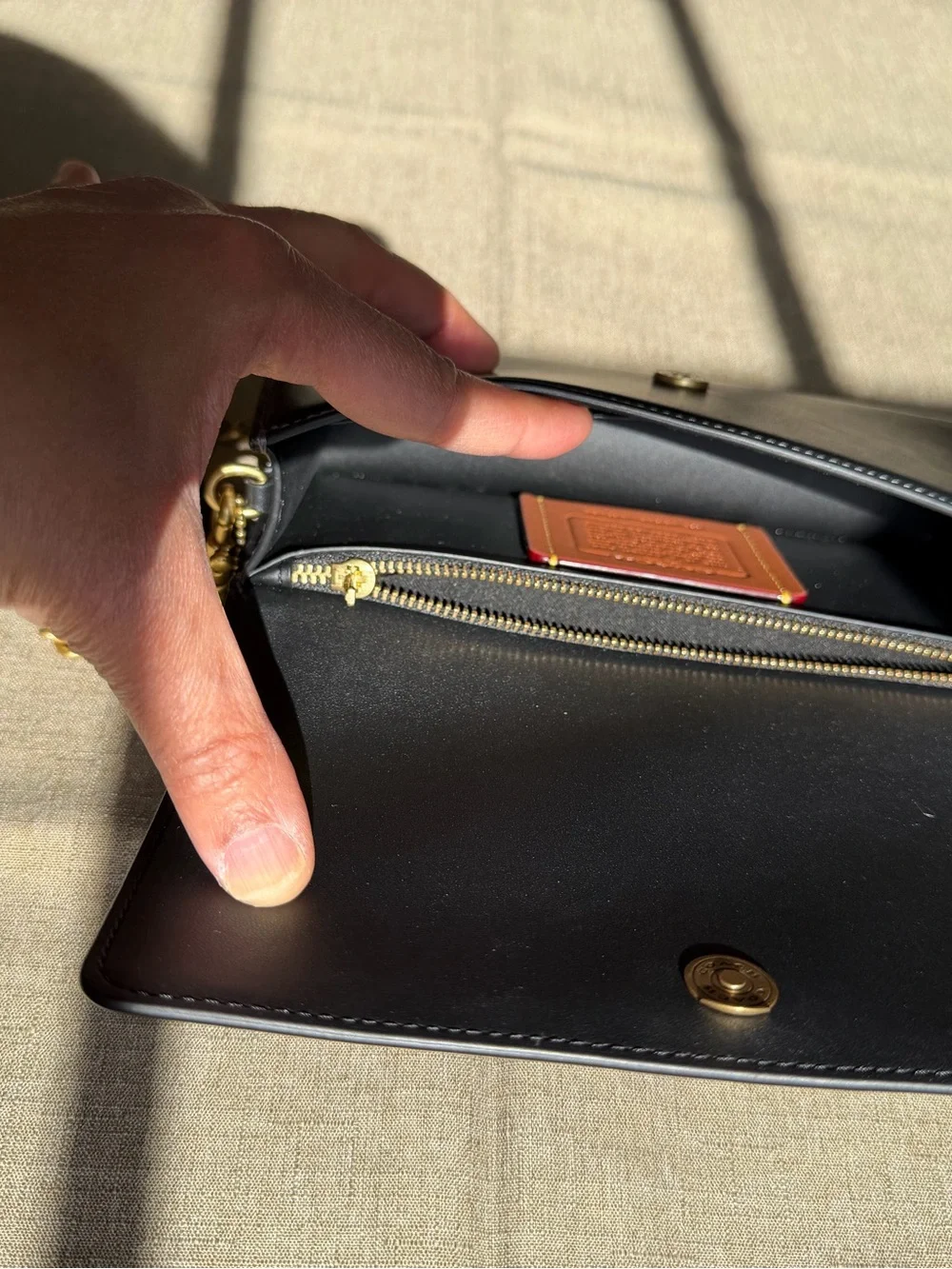 Coach sleek black